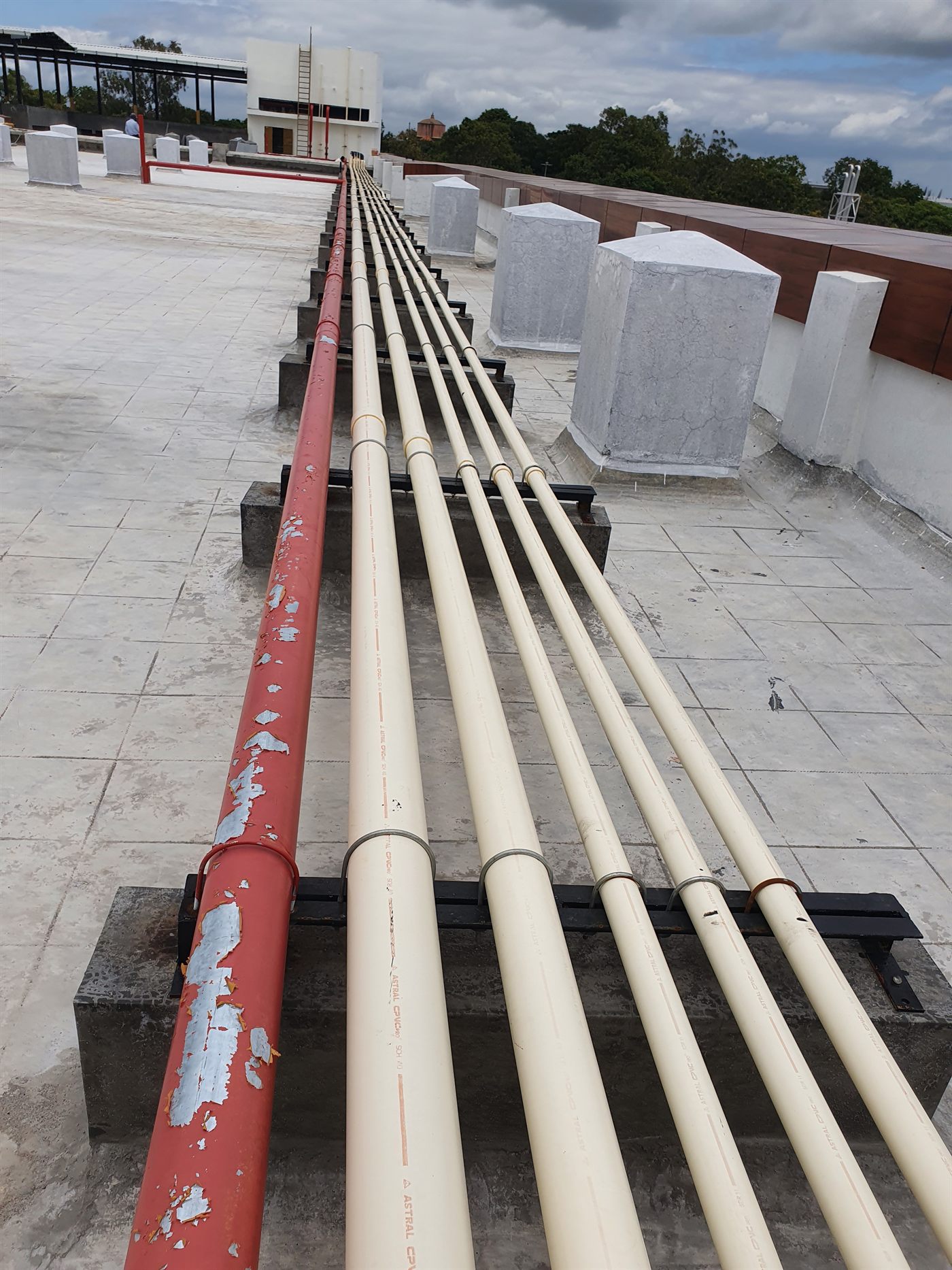CPVC supply mains run across the terrace at IIT Dharwad